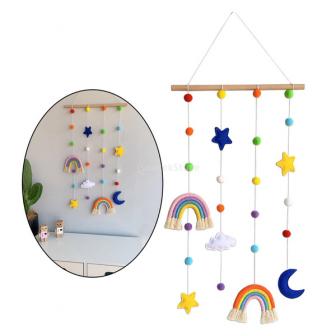 hanging display with colorful rainbows, paired with moon, star and felt balls